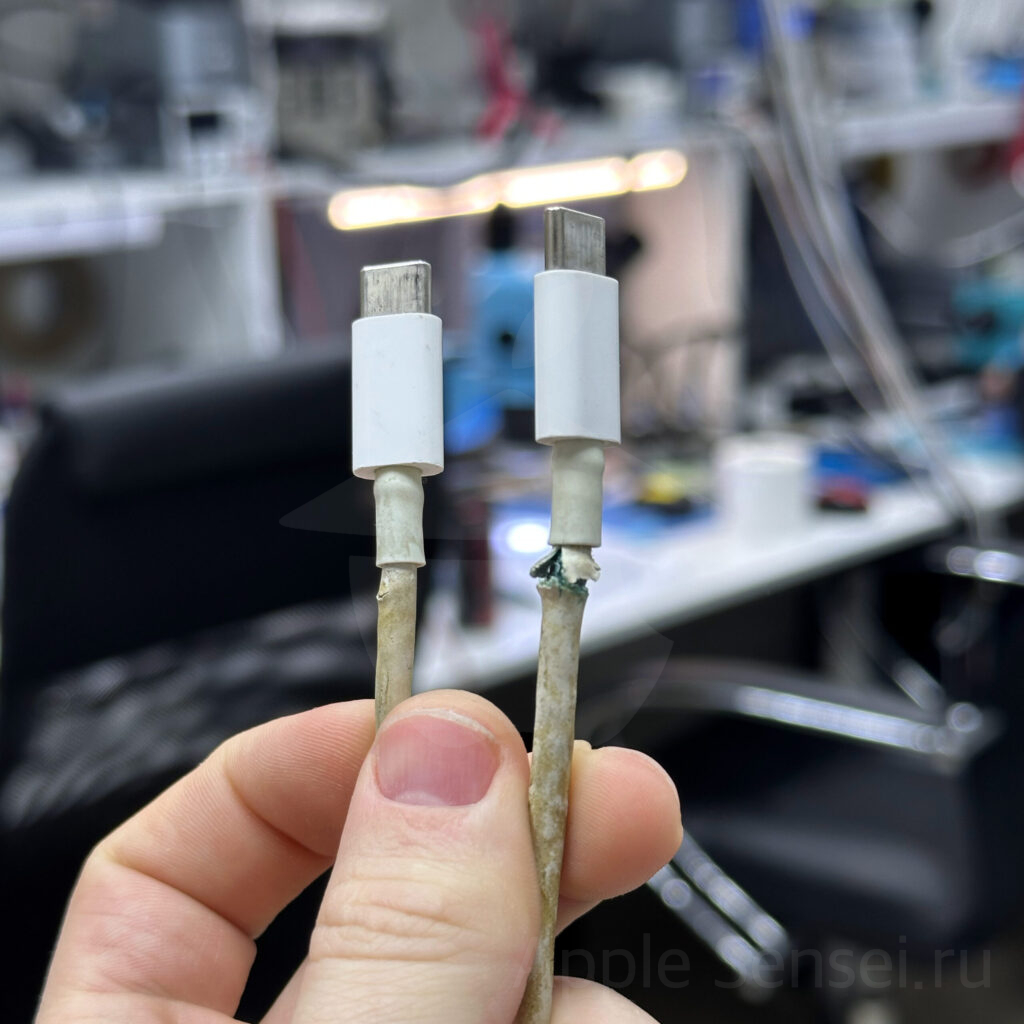 Изношенный провод Apple USB-C от MacBook.